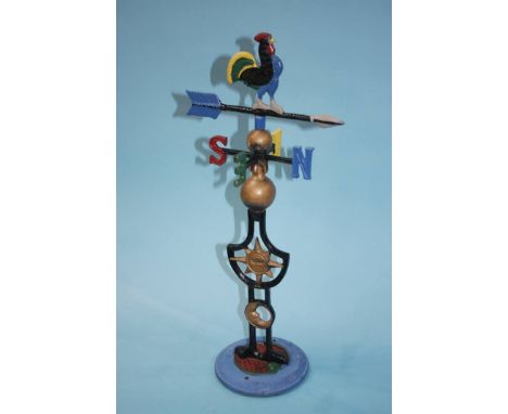 A decorative cast iron weather vane