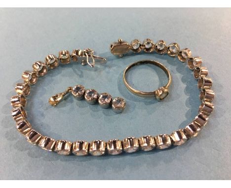 A matching ring, pendant and bracelet