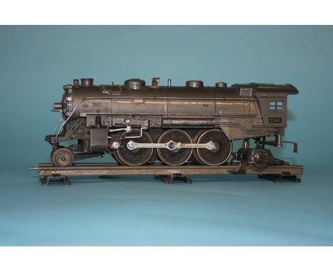 A '0' gauge locomotive, number 224E, with underside stamp "0 Gauge Locomotive, Made in U.S. of America, The Lionel Corporatio