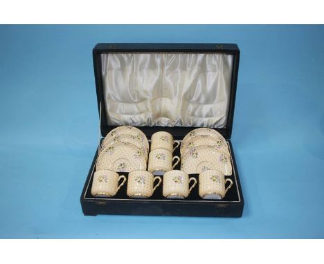 A cased set of six Spode china 'Old Concord' pattern coffee cups and saucers