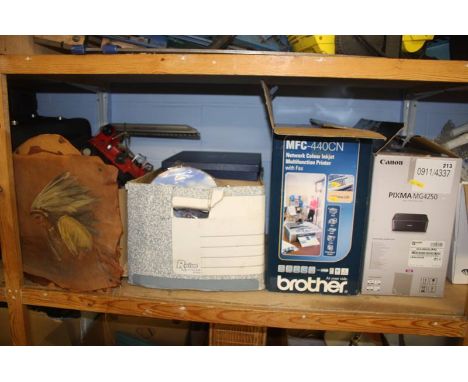 A shelf of miscellaneous, printers and sheet music etc.