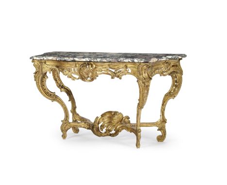 Console d'époque Louis XV, en bois richement sculpté, ajouré et doré à décor de rocailles et feuilles d'acanthe, pieds galbés