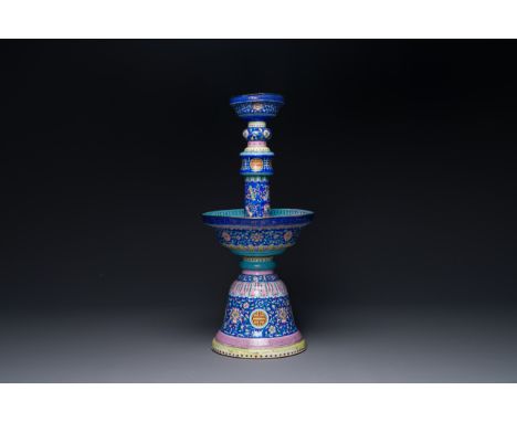 A large Chinese Canton enamel blue-ground 'shou' candlestick, Qianlong/JiaqingH.: 45 cm