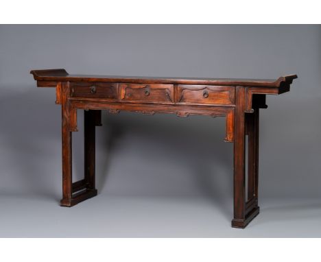 A Chinese wooden three-drawer console table, 19/20th C.Dim.: 175 x 40 x 93 cm  Provenance: The collection of Galerie Beaute C