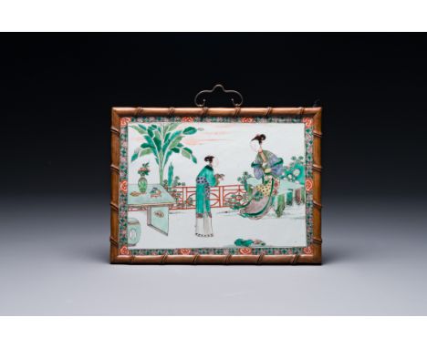 A Chinese rectangular famille verte plaque in wooden faux bamboo frame, Kangxi Dim.: 27,5 cm x 20,5 cm 