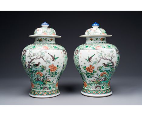 A pair of Chinese famille verte 'bird and flower' vases and covers, Kangxi mark, 19th C. H.: 43 cm  