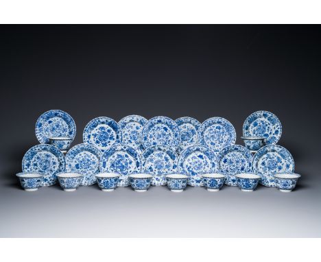 Ten Chinese blue and white cups and fourteen saucers with floral decor, lingzhi mark, KangxiDia.: 8,7 cm - H.: 5 cm (the cups