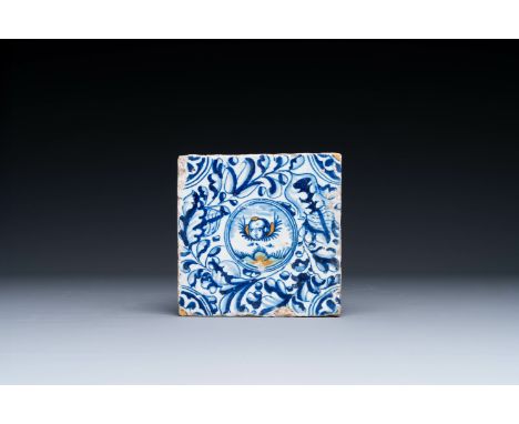 A fine Dutch Delft polychrome maiolica tile with a cherub, ca. 1600 Dim.: 13,5 x 13,5 cm