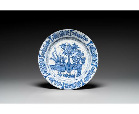 A Chinese blue and white 'antiquities' dish, KangxiDia.: 35,7 cm
