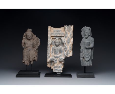 A Gandhara grey schist sculpture of the Bodhisattva Maitreya, a fragment of a seated Buddha and a sculpture of a master with 