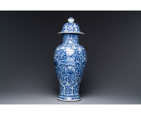 A Chinese blue and white vase and cover with floral design, Kangxi H.: 52 cm