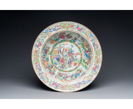 A large Chinese Canton famille rose 'Qi Lin Song Zi' basin, 19th C.Dia.: 42 cm - H.: 13,5 cm__PRESENT