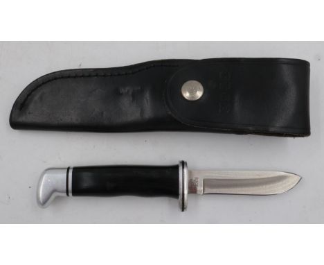 Buck model 116, with black leather sheath. UK P&amp;P Group 1 (£16+VAT for the first lot and £2+VAT for subsequent lots) 