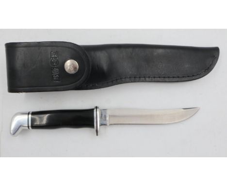 Buck model 105, with leather sheath. UK P&amp;P Group 1 (£16+VAT for the first lot and £2+VAT for subsequent lots) 