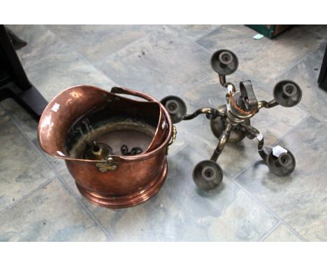 A George I style brass five branch chandelier, central ring section above knopped body, the drip pans with ropetwist borders,