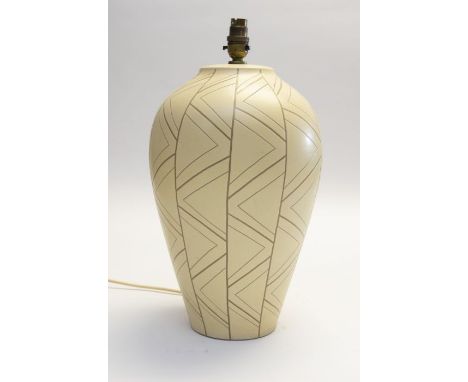 Studio Pottery: a large studio pottery lamp base, cream ground with incised geometric pattern to the body. Height approx 40cm