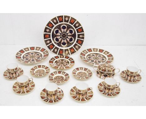 Royal Crown Derby Imari 1128 collection including six coffee cans and saucers, a lidded sugar basin, a large dinner plate, tw