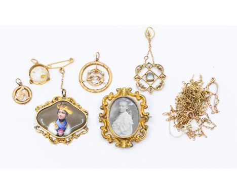 An Edwardian gold, aquamarine and seed pearl openwork pendant, stamped 15ct, approx 2.8gms (af); an Edwardian gold, ruby and 