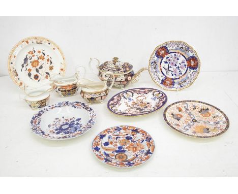 A collection of early 19th Century Derby Imari to include teapot and cover (AF - restorations to cover finial); three various