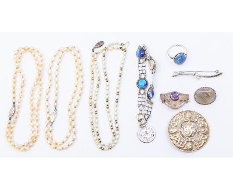 A collection of jewellery to include three cultured pearl necklaces, along with an early 20th century butterfly wing silver r