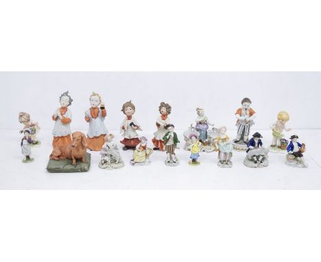 A collection of 17 soft paste porcelain figurines, including: a Capodimonte dachshund, 5 Sitzendorf examples, 2 Goebel exampl