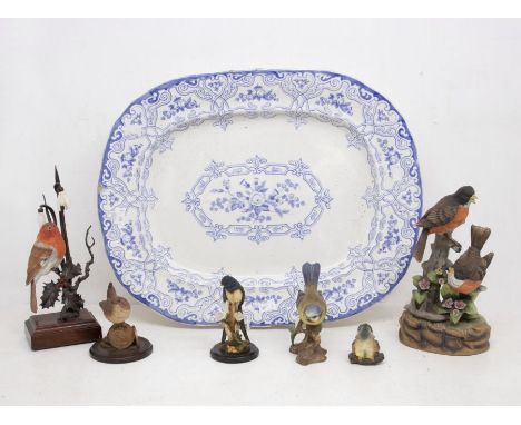 A collection of ceramic bird figures along with early 20th Century blue and white meat plate