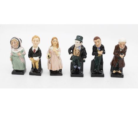 A collection of six Royal Doulton Dickens character figurines, including: Scrooge, Little Nell, Oliver Twist, Bill Sikes, Uri