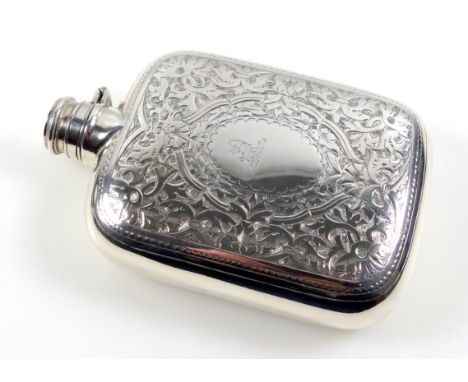 Late Victorian silver spirit flask with all-over engraved floral decoration, lion?s head crest and bayonet stopper, by George