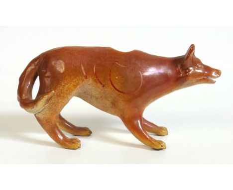 Alan Caiger-Smith (1930-2020), a rare studio model of a fox, tinted lustre with painted markings signed, 19 cm long. Note: No