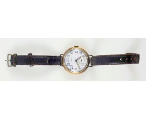 9ct. gold wristwatch with a circular white enamelled dial inscribed ?J W Benson, London?, and seconds dial enclosing a Swiss 