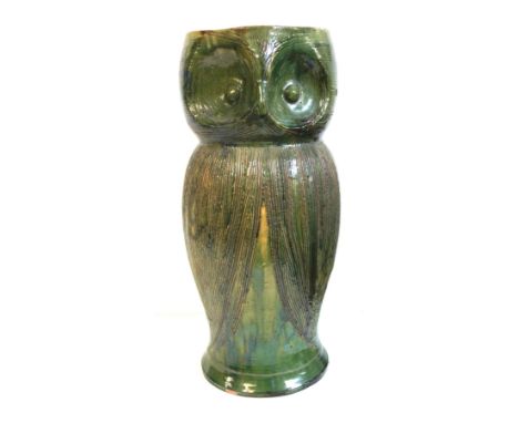 Farnham Pottery green glazed stick stand modelled as an owl, with incised decoration, 56 cm high 