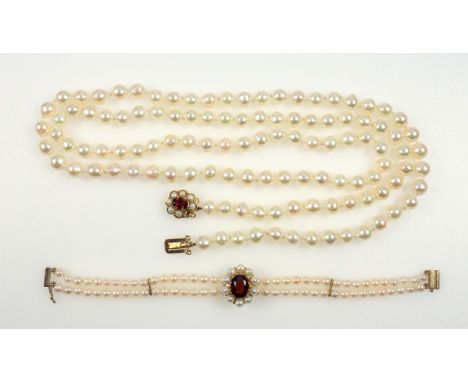 Freshwater pearl necklace with 114 7mm uniform beads with a 9ct gold clasp set garnet and 7 half pearls (1 missing), by HBJ, 