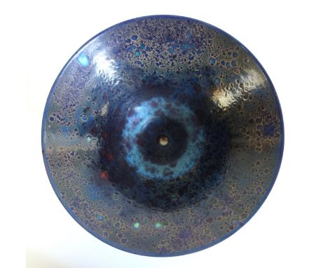 Sutton Taylor (born 1943), A Studio pottery footed bowl with a splashed drip pool lustre finish in dark and light blue, the s