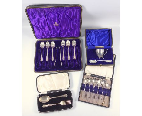 Set of 6 silver scroll handled coffee spoons and a pair of sugar tongs, by Harrison Brothers and Howson, Sheffield 1930, in a