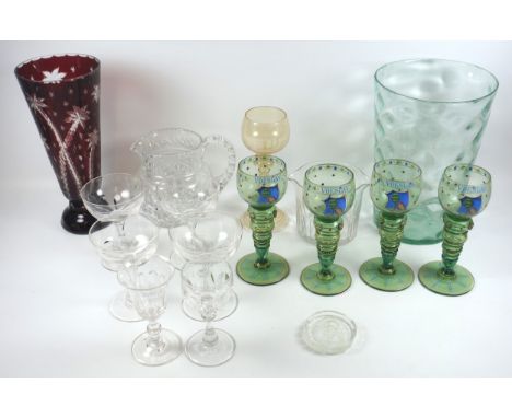 A German glass roemmer, four Continental green glass hock type glasses, a flash cut ruby glass vase, a green tinted ?dimple? 