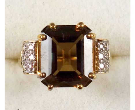 9ct. gold ring set emerald cut smoky quartz with diamond set shoulders, by D K, Birmingham 2006, 4.7grs 