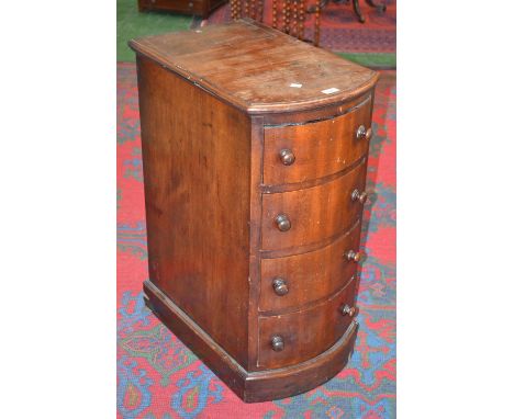 A Victorian mahogany bowfronted tall chest of drawers, moulded top, four drawers,button handles, plinth base (formerly part o