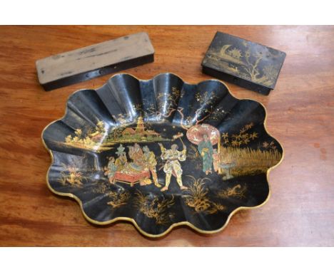 A Meiji period lacquered papier-mache bowl; a Japanese lacquered trinket box; a Victorian lacquered wooden pen box. (3)