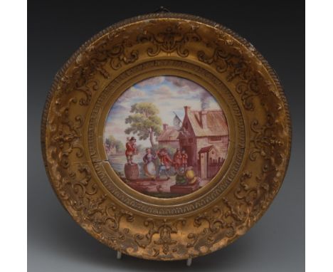 A large George III South Staffordshire enamel convex circular panel, painted in polychrome with revelers outside a tavern, fl