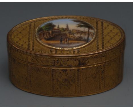 A 19th century Continental gilt metal oval table snuff box, hinged cover centred by a porcelain cabochon decorated with a tow