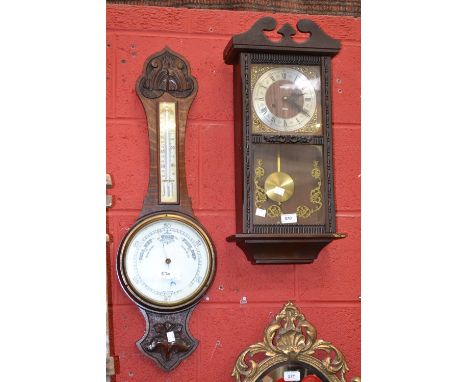 An Oak barometer, a wall clock (2)