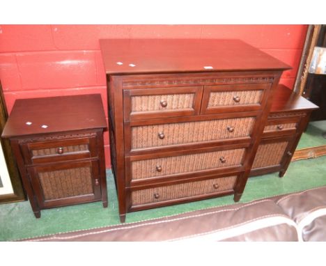 A contemporary chest of drawers, two short drawers with rattan effect fronts over three long, button handles; two conforming 