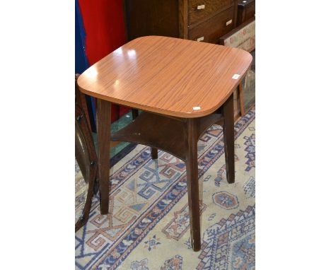 A 1950s kitchen table of small proportions, rounded square top, undertier shelf 