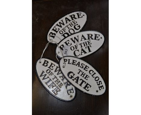 Four oval cast iron signs - Beware of the wife, dog, cat and Please close the gate.
