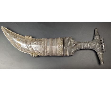 A 19th century Arab Yemeni or Saudi signed silver jambiya dagger, L.26cm blade length 12.5cm