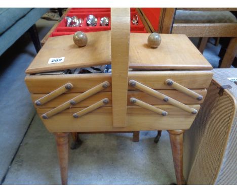 Light Elm Cantilever sewing box on wheels with contents