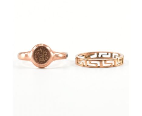 Two vintage gold ring. The first a 14ct yellow gold Greek key pierced design band ring, marked 585. Together with a hallmarke