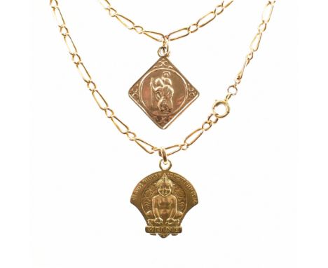 A vintage gold necklace chain having a French gold Biliken pendant and a hallmarked 9ct gold St Christopher pendant. The chai