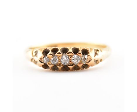 An 18ct yellow gold &amp; diamond five stone ring. The ring having five round cut graduating diamonds to a buttercup setting 