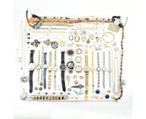 A collection of vintage costume jewellery and watches. The lot to include a selection of vintage mid Century brooches, a face